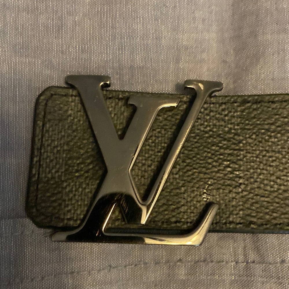 Like new authentic Louis Vuitton items hat belt and coin pouch.